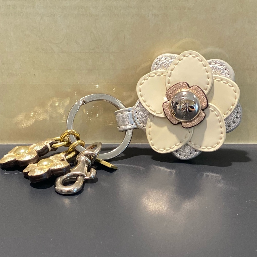 Leather coach flower fob